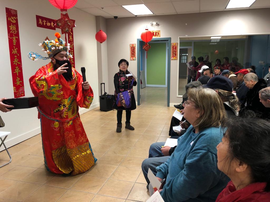 For Lunar New Year celebrations, Programming Committee member Edwin dressed up as the Prosperity God (財神) as he co-emceed the party with Maggie, a member of the May Wah Hotel Advisory Board.